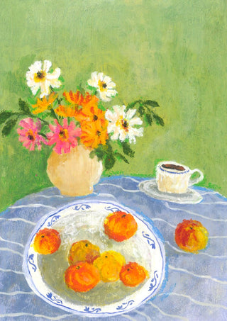 February Zinnias by Deblina Dey - zinnias in a cream jug with oranges on a blue striped cloth