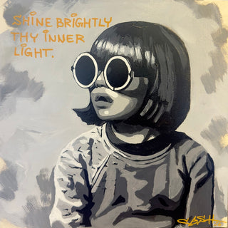 Shine Brightly by Cash - a girl in round sunglasses under a hand-written orange line