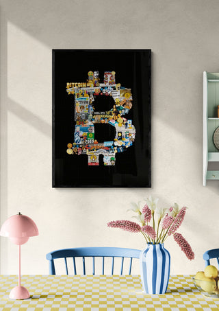 Framed BTC Gigante artwork by Ricardo Noble hangs on a wall above a colorful dining table with flowers.