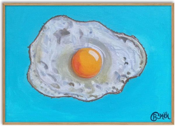 Fried Egg on Blue by Art By Biba - one fried egg with an orange yolk on a flat turquoise ground