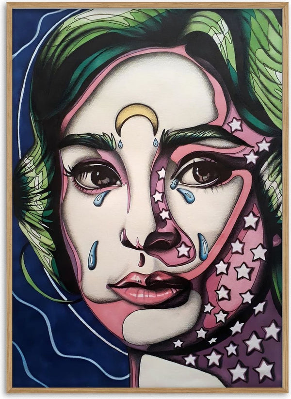 Audrey Hepburn by Okiana - a tearful split-toned portrait with a gold crescent and white stars on navy