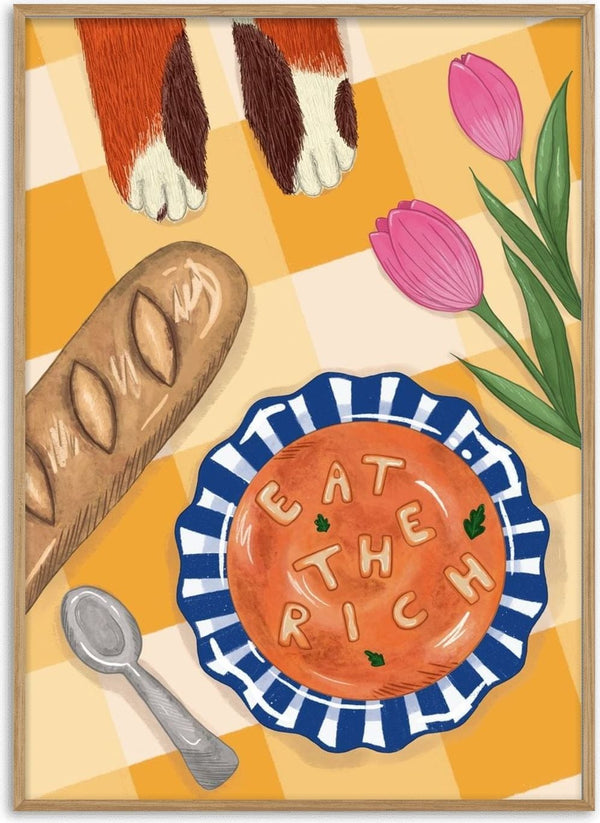 Dinner Is Served by Noomi Rubeksen - tomato soup spelling EAT THE RICH in alphabet pasta, with a baguette, tulips and cat paws