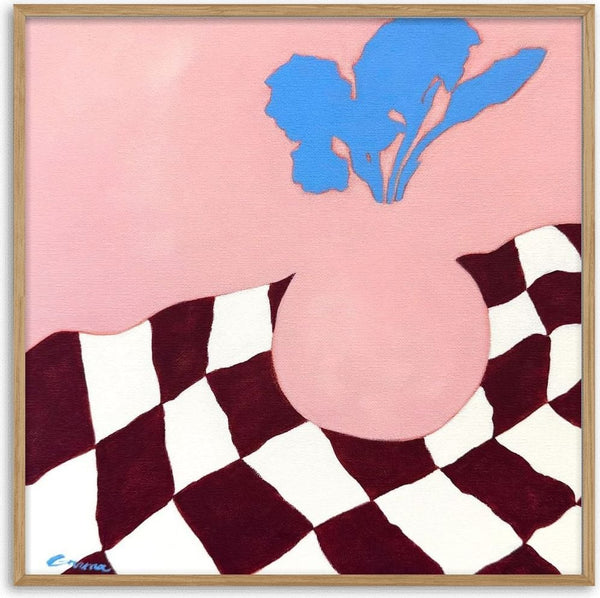 Iris by Elva Garma - blue iris in a pink vase on a maroon and white checked cloth
