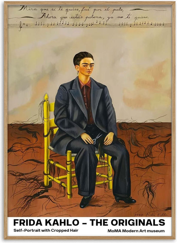 Frida Kahlo seated in a suit on a yellow chair, with cropped hair and cut locks on the floor.