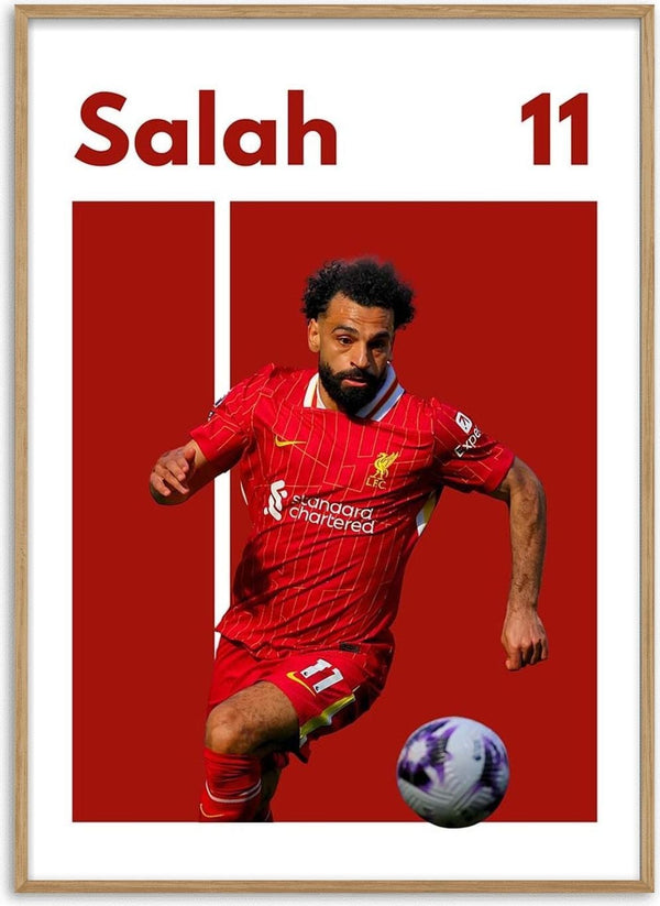 Poster of Salah in Liverpool kit with number 11, running with a football on a red and white background.
