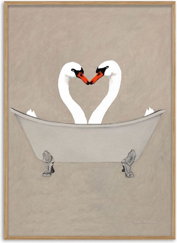 Two swans forming a heart shape with their necks while sitting together in a vintage-style bathtub.